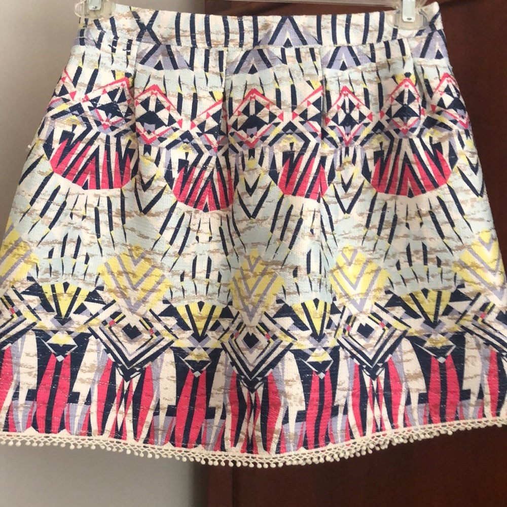 Precious mini skirt. Beautiful detail.